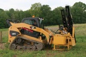 KIWI Skid-Steer Side-Slide Self-Contained Post Driver