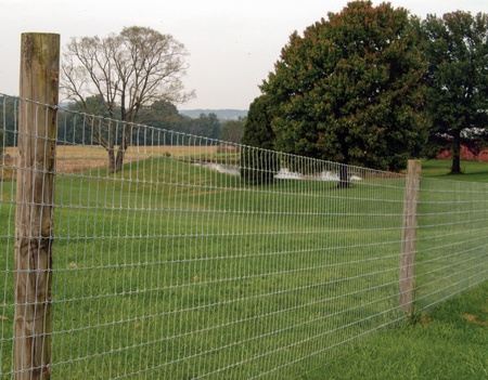 HOW TO WRAP WIRE FENCE - Woven wire field fence install 